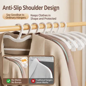 Multifunctional non-slip clothes hangers with clips, wide shoulder seamless design for home use.
