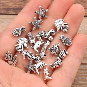 Set de abalorios de aleacion de plata para joyas artesanales y manualidades de disenos.