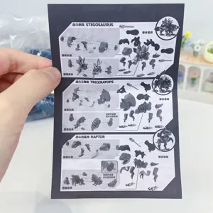 Detailed assembly instructions showing steps for building dinosaur mechanical model sets.