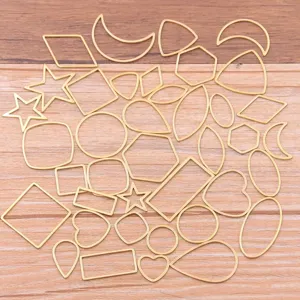 Charmes de lunette géométriques en or en acier inoxydable pour la fabrication de bijoux.