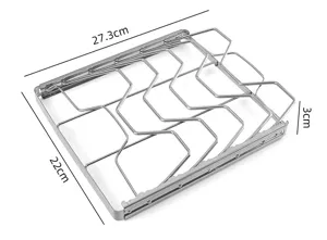 Stainless steel folding grill rack detail showing compact size and wire mesh construction.