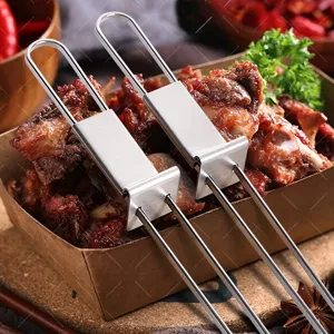 Stainless steel BBQ grilling forks detail view, portable dual-prong skewers for outdoor camping.