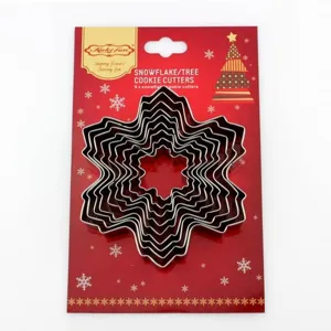 Stainless steel snowflake cookie cutter detail, 9 pieces set, durable baking mold for festive treats.