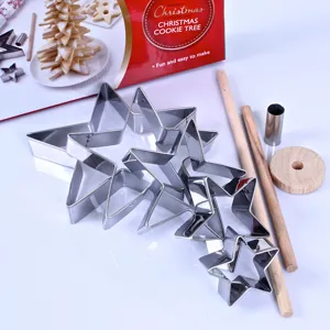 Stainless steel star cookie cutter set for making creative Christmas tree shaped biscuits.