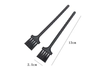 Detailed view of black cleaning brushes with dimension markers, perfect for dust and detail work.