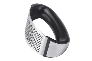 Stainless steel garlic press rocker detail view, ergonomic kitchen tool for easy garlic mincing.