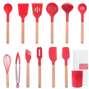 11-teiliges Silikon Küchenutensilien Set mit Holzgriffen, Pfannenwender und Aufbewahrung.