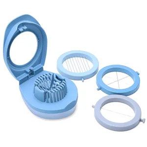 Close-up detail of the blue multi-functional egg slicer showing interchangeable cutting discs.