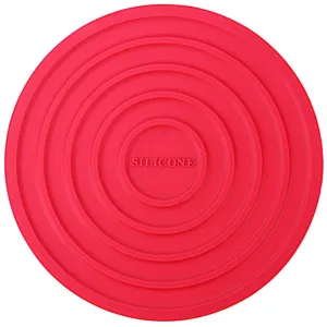 Detail rode siliconen hittebestendige mat, antislip placemat met concentrische cirkels.