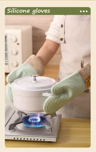 Gants d'isolation de cuisson en silicone détail montre un matériau épais et résistant surface.