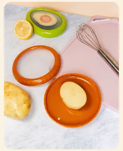 Reusable silicone food preservation covers stretch lids for fresh fruit and kitchen storage detail.