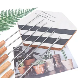 6-piece stainless steel cheese fondue forks with wooden handles for chocolate fruit.