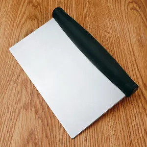 Stainless steel bench scraper and dough cutter with comfortable black handle for kitchen baking.