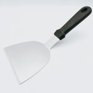 Stainless steel griddle scraper with black plastic handle, detailed view of BBQ spatula blade.