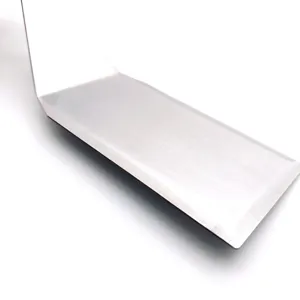 Stainless steel spatula detail shot, durable metal turner for BBQ grill and teppanyaki cooking.