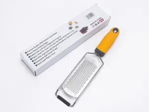 Stainless steel cheese grater detail view featuring sharp blade and yellow handle