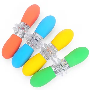 Stainless steel corn skewer close-up, interlocking colorful TPR handles for barbecue.