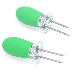 Stainless steel corn holders with green TPR handles, perfect for BBQ and outdoor parties.