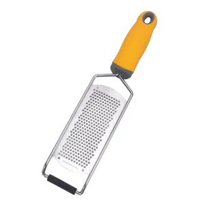 Stainless steel cheese grater and lemon zester with ergonomic yellow handle for kitchen.