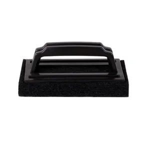 Detail view of black grill cleaning brush with durable scrubbing pad and ergonomic handle.