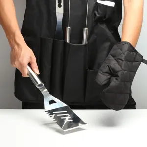Black BBQ apron set with stainless steel grilling tools and heat-resistant oven mitt for outdoor.