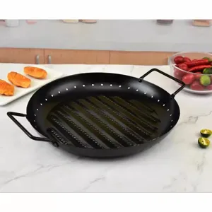 Round black metal barbecue grill pan with dual handles and ventilation holes for outdoor picnic.