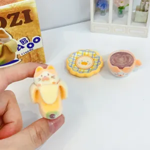 Cute cat banana flocked figurine detail, miniature toy display, desktop ornament showcase.