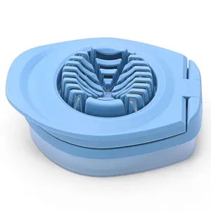 Creative Japanese 3-in-1 egg slicer with stainless steel wires for kitchen cooking.