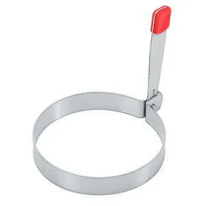 Stainless steel fried egg ring detail showing the folding handle and red silicone grip.
