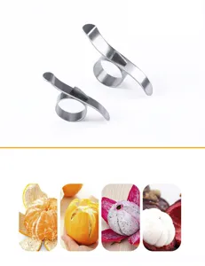 Edelstahl Orangen-Schäler Detailansicht, zeigt das Ring-Design und saubere Fruchtergebnisse.