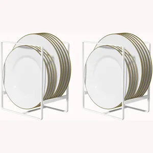 White metal plate rack kitchen dish drying organizer holder with elegant white and gold plates.
