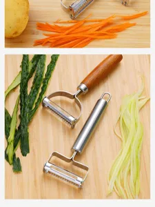 Detail view of stainless steel double-head vegetable peeler and shredder for kitchen use.