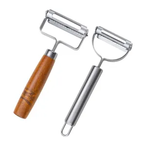 Stainless steel vegetable peeler with wooden handle and dual-head kitchen tool for potatoes.