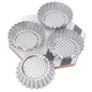 Stainless steel egg tart molds set, wave edge baking cups for homemade cakes and pastries.