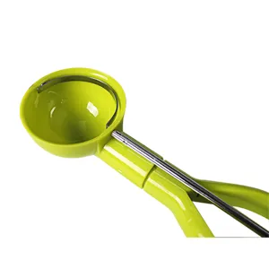 Green plastic ice cream scoop with metal trigger release, perfect kitchen tool for desserts.