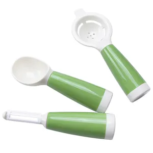 Mini keukengereedschap set met verwisselbare groene handgrepen, eierscheider, lepel en schiller.