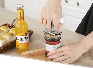 Apribarattoli in acciaio inox strumento da cucina multifunzione per aprire i coperchi.