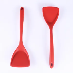 Durable red silicone spatula set for non-stick cookware, heat-resistant kitchen cooking tool.