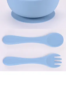 Silicone baby suction bowl spoon and fork set detail showing food grade material features.