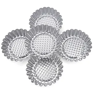Set of 5 stainless steel egg tart molds, fluted baking cups for mini cakes and pastries.