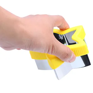 Stainless steel star cookie cutter detail view with yellow safety handle for DIY baking.