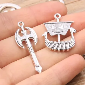 Viking ship and axe metal charms, vintage silver alloy DIY jewelry pendants for necklaces.