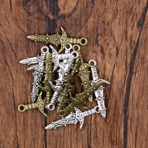 Alloy sword charm pendant details, miniature weapon jewelry accessory for DIY crafting projects.