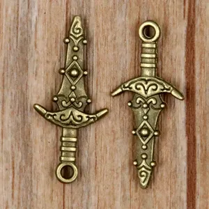 Vintage bronze alloy sword dagger charms for DIY jewelry making, ideal for unique handmade crafts.