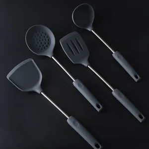 4-piece silicone kitchen utensil set with stainless steel handles, non-stick cookware tools.