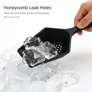 Pala per ghiaccio in silicone nero con fori di drenaggio a nido d'ape, ideale per cucina.