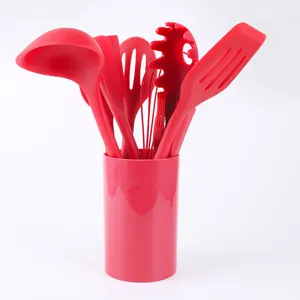 Set di utensili da cucina in silicone rosso con supporto antiaderente per cottura
