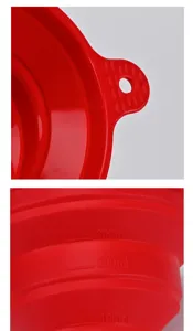 Dettagli dell'imbuto in silicone rosso pieghevole con chiare tacche di scala per cucina.