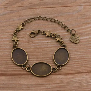 Base de bracelet DIY en alliage bronze vintage avec plateaux ovales et amulettes etoiles.