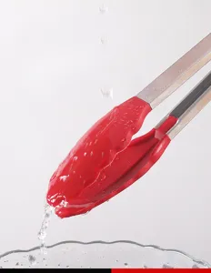 Stainless steel silicone food tong detail, high temperature resistant cooking clip close up.